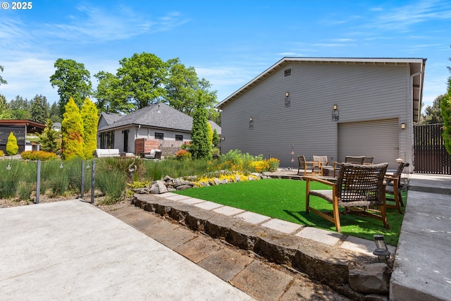 22961 SE Filbert Rd, Eagle Creek, OR 97022 - view of yard featuring a patio and a garage