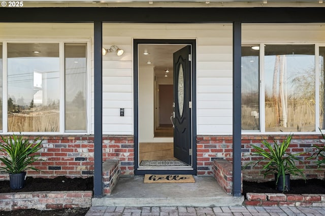 property entrance featuring covered porch