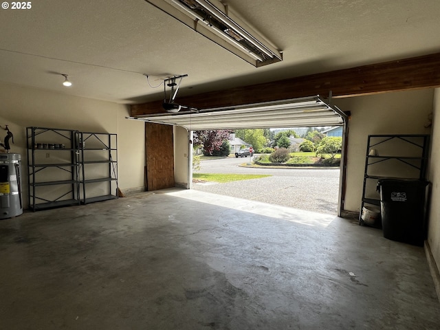 1011 Heather Ct, Reedsport, OR 97467 - garage featuring water heater