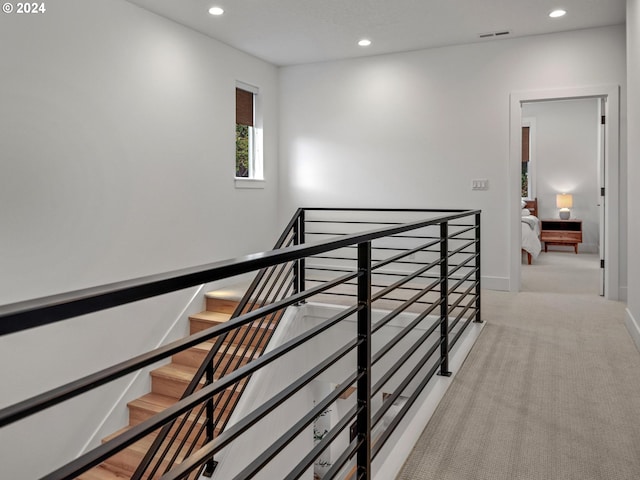 stairway with carpet floors