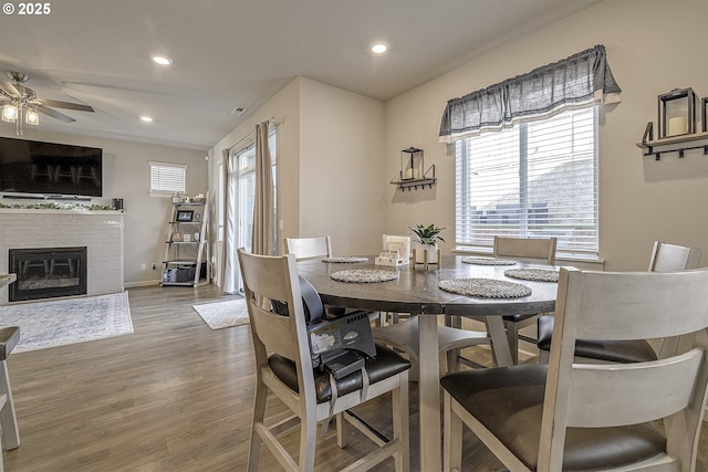 dining area featuring ceiling fan and hardwood / wood-style flooring