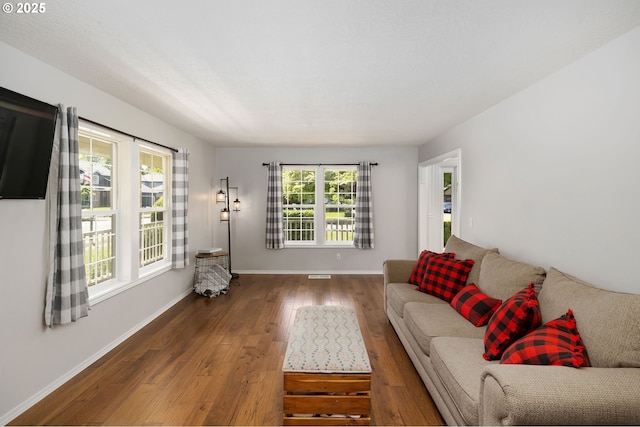 17890 SW 109th Ave, Tualatin, OR 97062 - living area featuring baseboards and wood finished floors