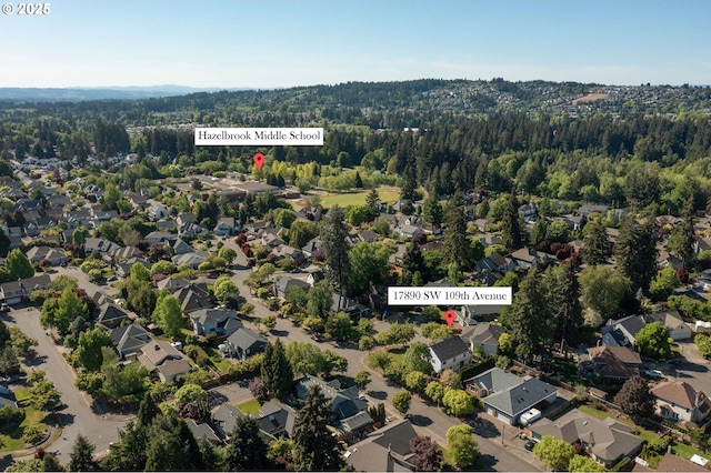 17890 SW 109th Ave, Tualatin, OR 97062 - aerial view of property and surrounding area with a forest and nearby suburban area