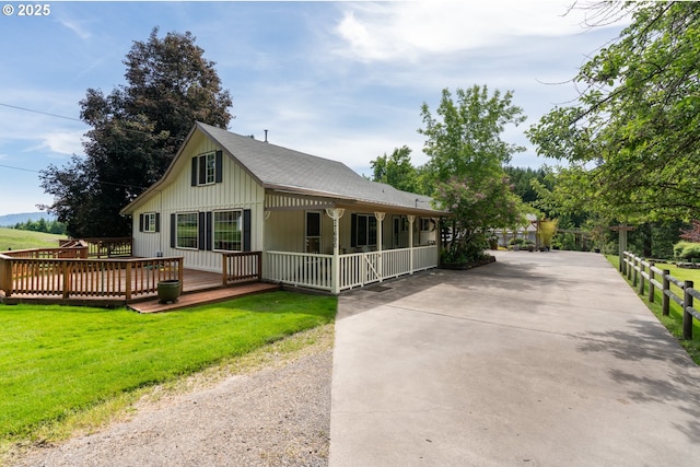 77690 Brock Rd, Oakridge, OR 97463 - view of front facade featuring a front lawn, driveway, and a porch