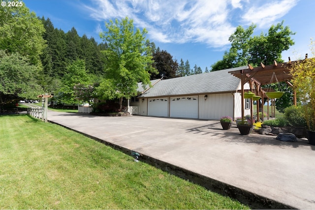 77690 Brock Rd, Oakridge, OR 97463 - view of front of house featuring a front yard, a garage, and driveway