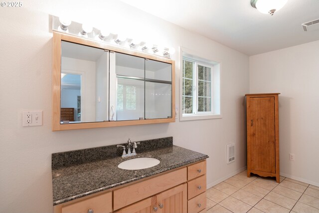 77690 Brock Rd, Oakridge, OR 97463 - bathroom featuring baseboards, vanity, and tile patterned floors