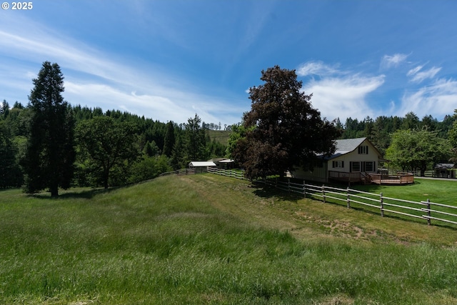 77690 Brock Rd, Oakridge, OR 97463 - view of yard featuring a wooden deck, a view of rural / pastoral area, and a wooded view