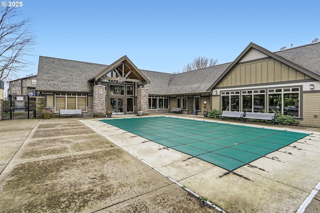 view of swimming pool with a patio area