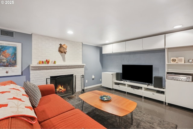 living room with a fireplace, recessed lighting, and baseboards