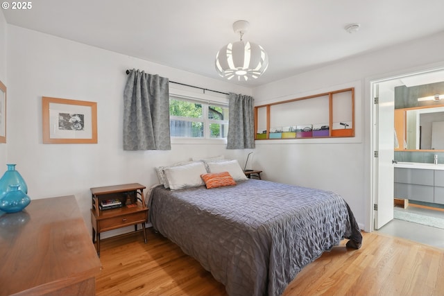 bedroom featuring wood finished floors
