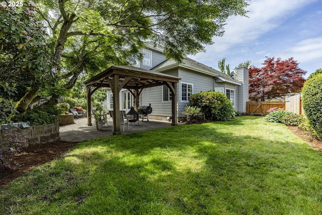 view of yard featuring a gazebo and a patio area