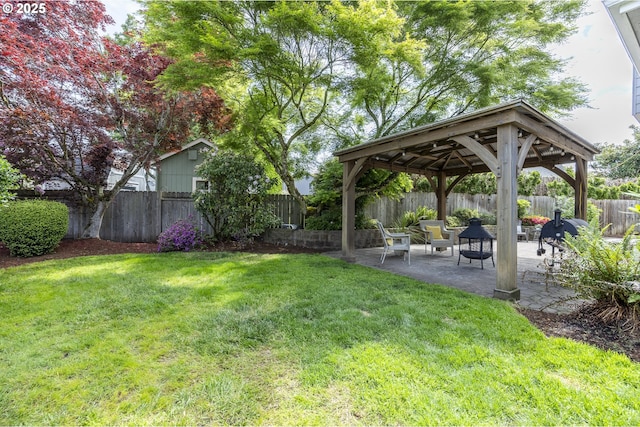 view of yard featuring a gazebo and a patio