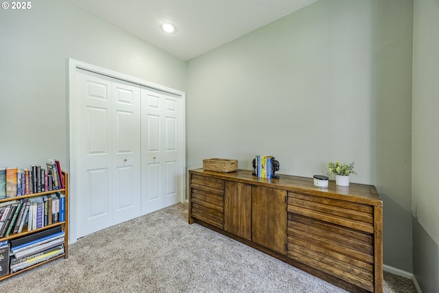carpeted home office with recessed lighting