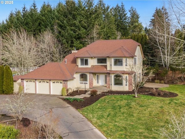 view of front of home featuring a garage, driveway, a front lawn, and a chimney