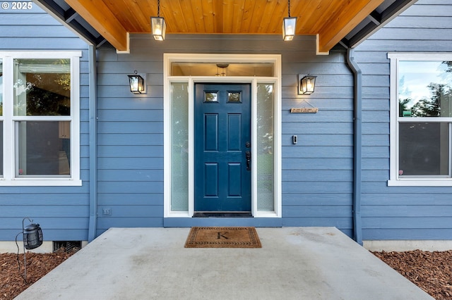 doorway to property featuring a porch