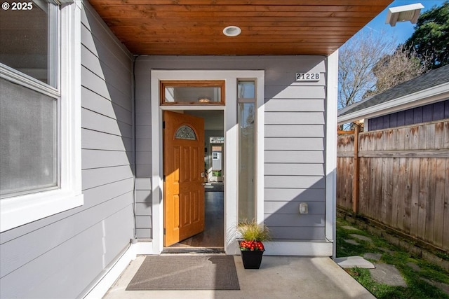 property entrance featuring fence