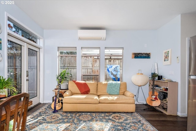 living room featuring dark wood-style floors, baseboards, and a wall mounted AC