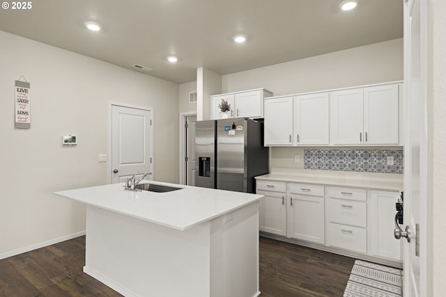 4781 Breitenbush Ave, Salem, OR 97301 - kitchen with stainless steel fridge with ice dispenser, white cabinets, dark wood-style floors, an island with sink, and recessed lighting