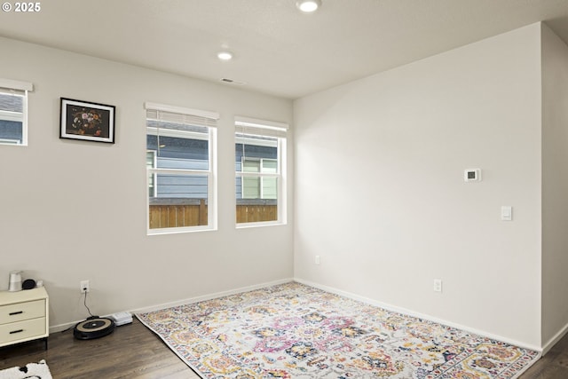 4781 Breitenbush Ave, Salem, OR 97301 - empty room featuring dark wood-type flooring and recessed lighting