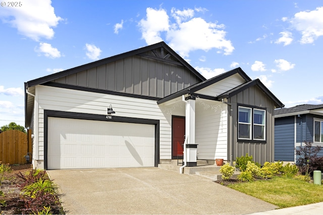 4781 Breitenbush Ave, Salem, OR 97301 - view of front of home featuring board and batten siding, a garage, and driveway