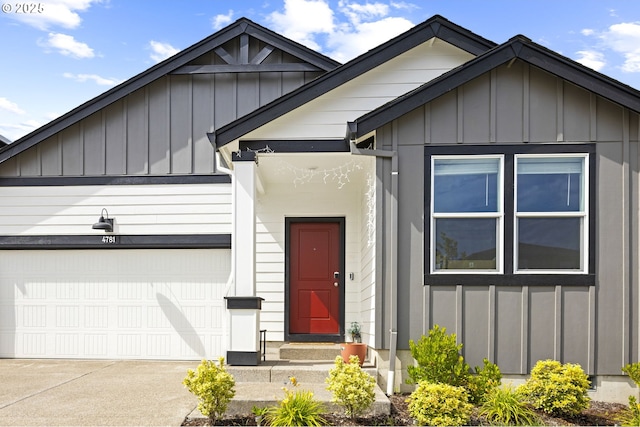 4781 Breitenbush Ave, Salem, OR 97301 - view of front of house featuring board and batten siding, an attached garage, and concrete driveway