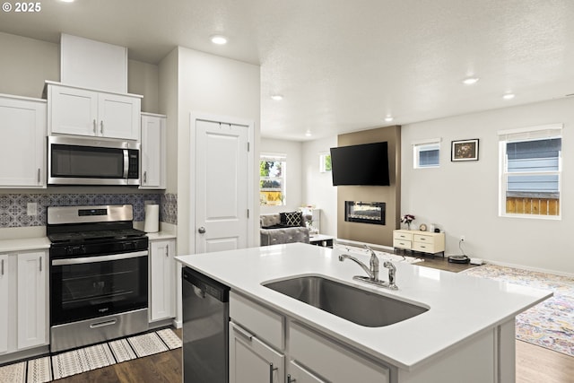 4781 Breitenbush Ave, Salem, OR 97301 - kitchen featuring appliances with stainless steel finishes, recessed lighting, wood finished floors, light countertops, and open floor plan