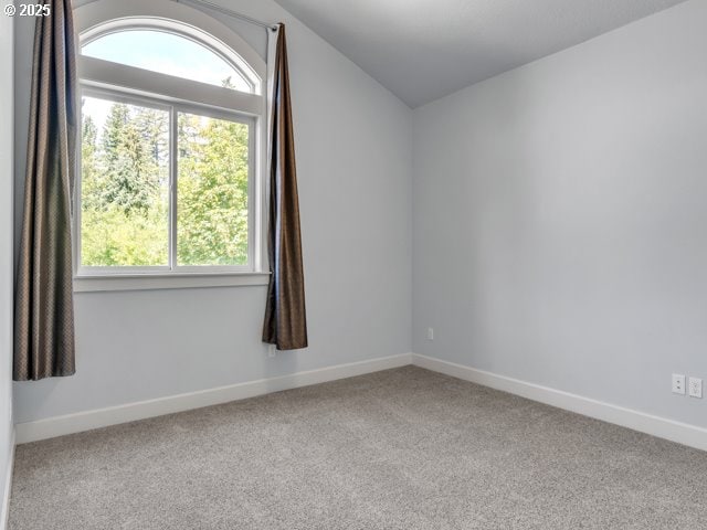 14509 SE Faircrest St, Clackamas, OR 97015 - unfurnished room featuring lofted ceiling and carpet