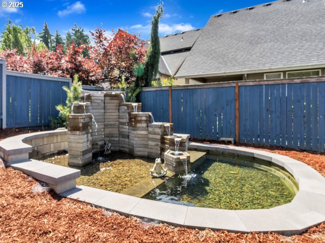 14509 SE Faircrest St, Clackamas, OR 97015 - view of yard featuring a garden pond