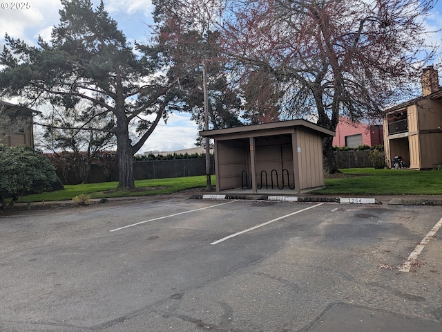 1246 NE 27th St Unit 24, Mcminnville, OR 97128 - uncovered parking lot with fence