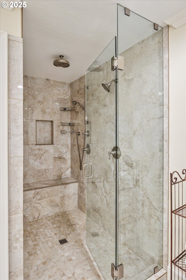 bathroom featuring an enclosed shower