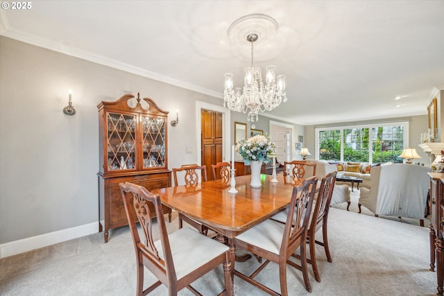 carpeted dining room featuring an inviting chandelier and crown molding