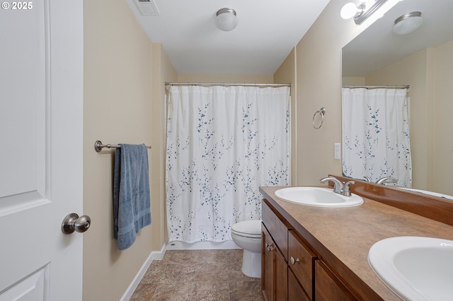 13420 SW 2nd St, Beaverton, OR 97005 - bathroom featuring double vanity, baseboards, toilet, and a shower with shower curtain