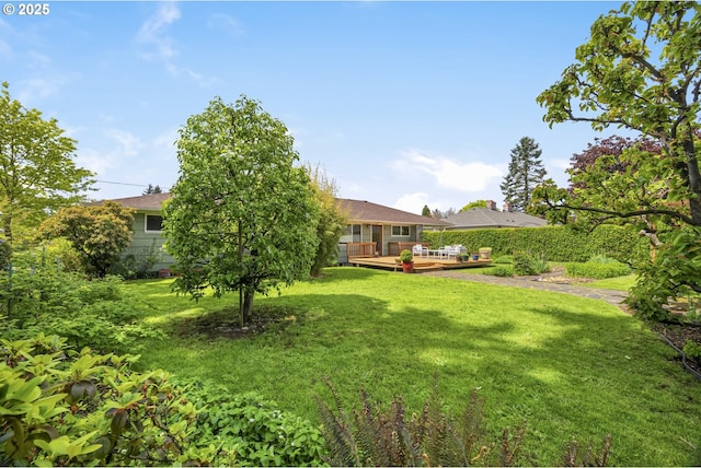 3132 SE 58th Ave, Portland, OR 97206 - view of green lawn featuring a deck