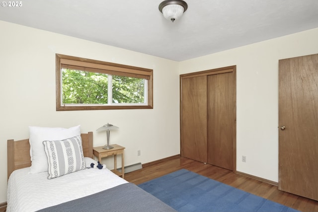 3132 SE 58th Ave, Portland, OR 97206 - bedroom with a baseboard heating unit and wood finished floors