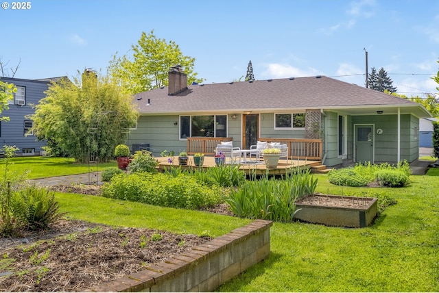 3132 SE 58th Ave, Portland, OR 97206 - back of house featuring a lawn, a deck, roof with shingles, and a chimney