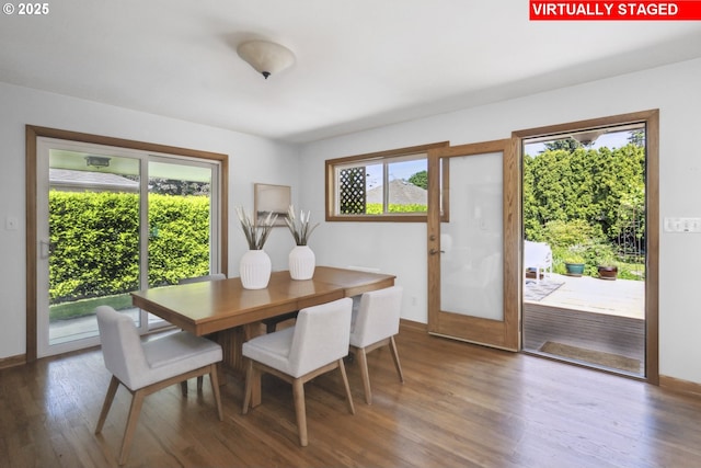 3132 SE 58th Ave, Portland, OR 97206 - dining room featuring wood finished floors and baseboards