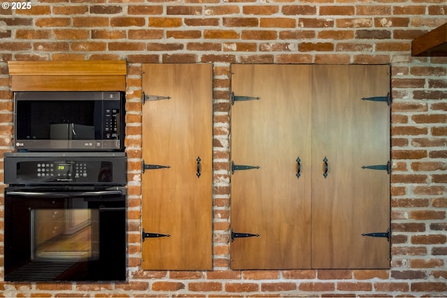 10776 SE Idleman Rd, Happy Valley, OR 97086 - kitchen featuring black oven and stainless steel microwave