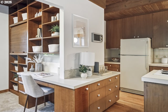 10776 SE Idleman Rd, Happy Valley, OR 97086 - kitchen featuring freestanding refrigerator, wooden ceiling with exposed beams, open shelves, decorative backsplash, and light countertops
