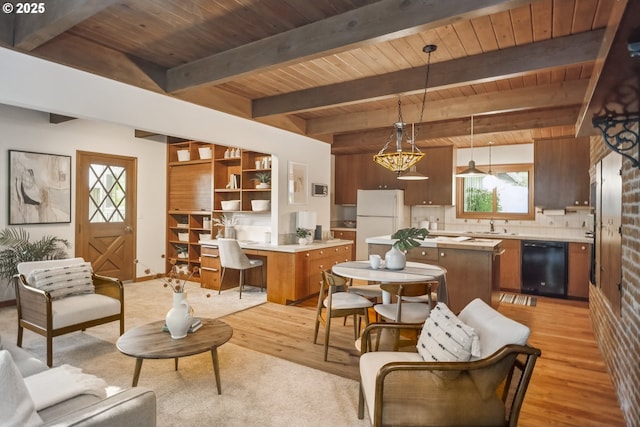 10776 SE Idleman Rd, Happy Valley, OR 97086 - living room featuring light wood-style flooring and wooden ceiling with exposed beams