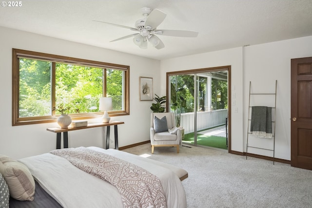 10776 SE Idleman Rd, Happy Valley, OR 97086 - carpeted bedroom with access to outside, baseboards, and a ceiling fan