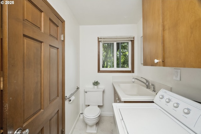 10776 SE Idleman Rd, Happy Valley, OR 97086 - bathroom featuring washer / clothes dryer, toilet, baseboards, tile patterned floors, and vanity