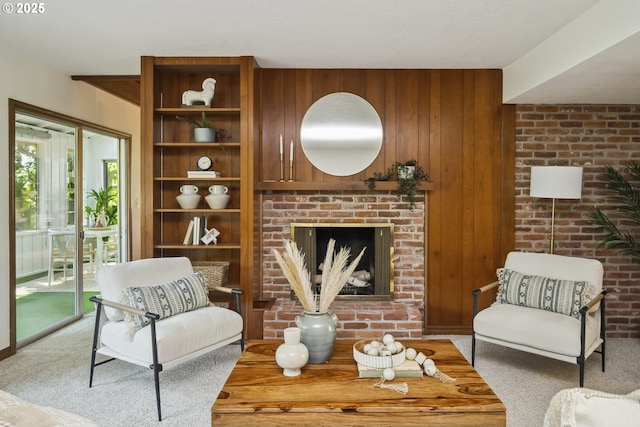 10776 SE Idleman Rd, Happy Valley, OR 97086 - living area featuring a brick fireplace, wood walls, and carpet flooring
