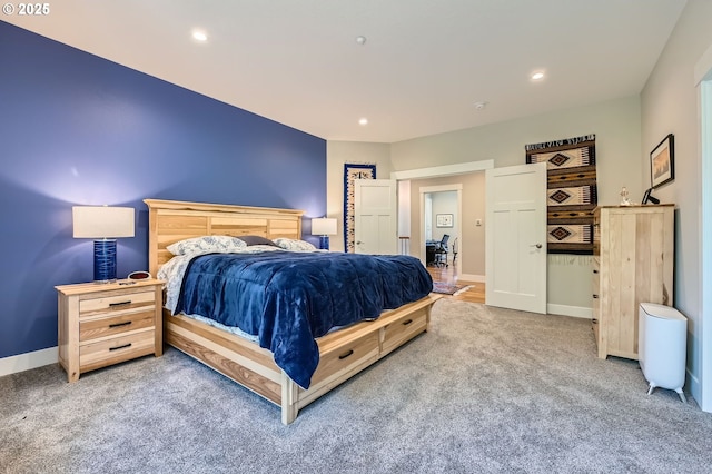 bedroom with carpet floors, baseboards, and recessed lighting