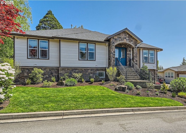 view of front of home featuring stone siding and a front lawn