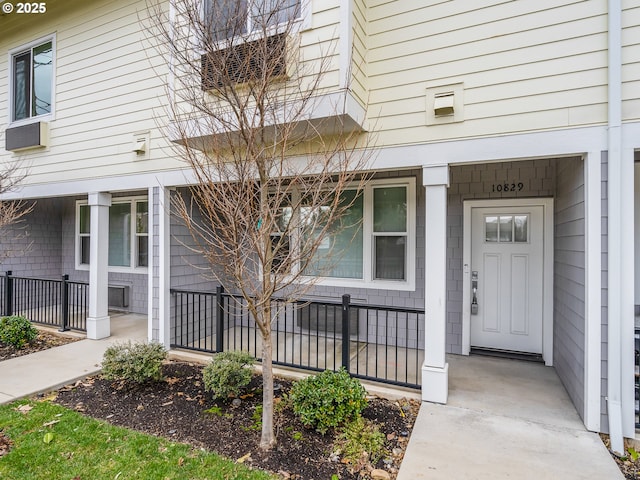 10829 E Burnside St, Portland, OR 97216 - property entrance featuring a porch