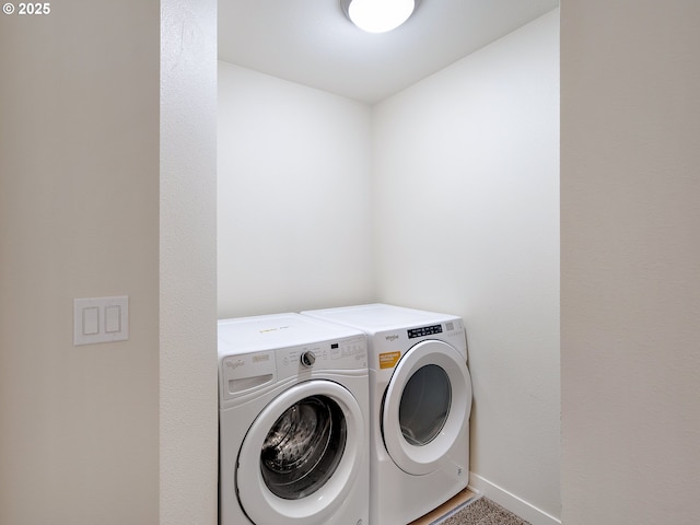 10829 E Burnside St, Portland, OR 97216 - washroom featuring washing machine and clothes dryer and baseboards