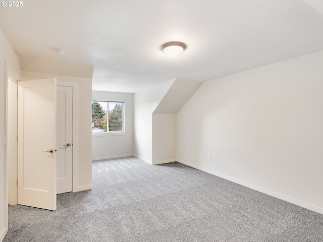 10829 E Burnside St, Portland, OR 97216 - additional living space with carpet flooring and baseboards