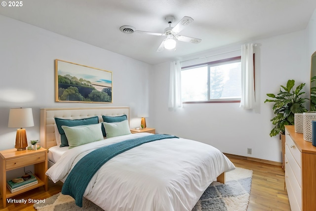 7430 N Burr Ave, Portland, OR 97203 - bedroom with light wood-style flooring, a ceiling fan, and baseboards