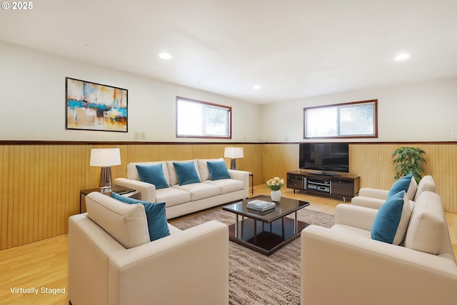 7430 N Burr Ave, Portland, OR 97203 - living room with a wainscoted wall, light wood-type flooring, healthy amount of natural light, recessed lighting, and wooden walls