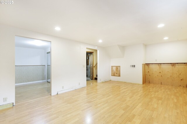 7430 N Burr Ave, Portland, OR 97203 - unfurnished room featuring light wood finished floors, recessed lighting, and baseboards